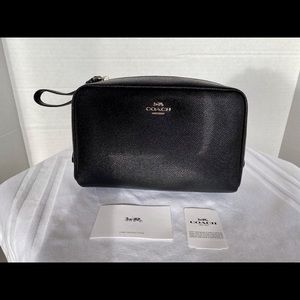 Coach brand-new black leather make-up bag